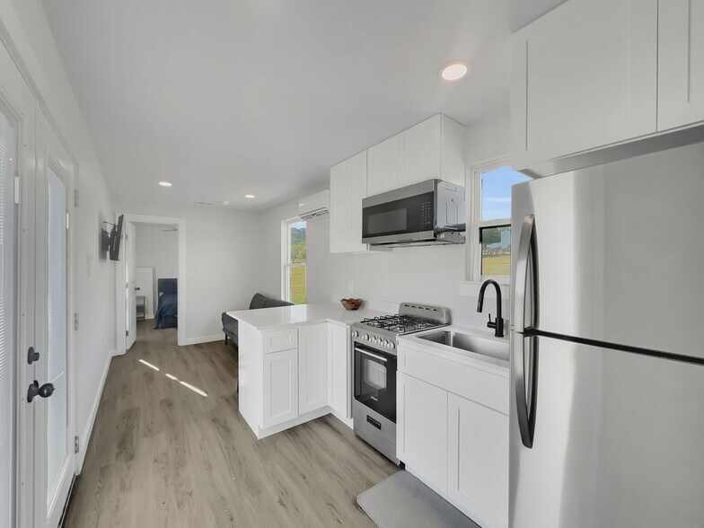 More Photos Of 14485 County Road 156, Bluff Dale Multifamily For Sale