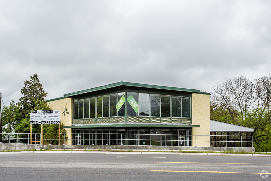 Primary Photo Of 7214 Cantrell Rd, Little Rock Storefront Retail Office For Sale