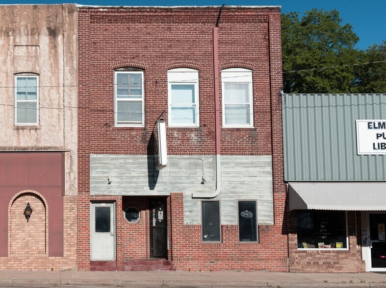 Primary Photo Of 107 N Main St, Elmwood Storefront Retail Residential For Sale