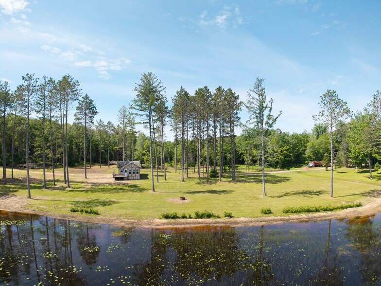 More Photos Of 8767 S Lyman Lake Rd, South Range Land For Sale