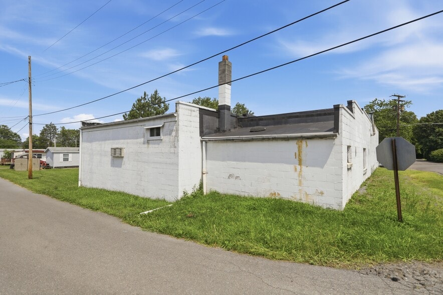 More Photos Of 455 Center Ave, Romney Auto Repair For Sale