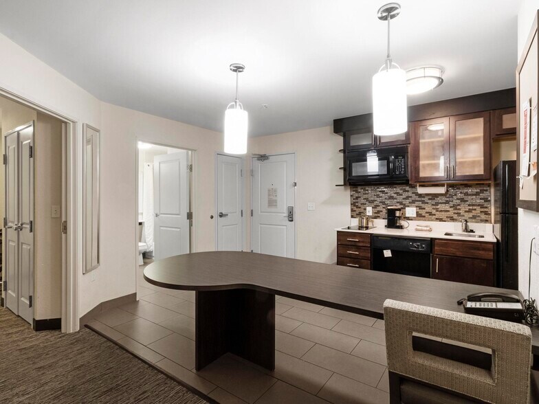 More Photos Of 1220 E Douglas Rd, Granger Hotel For Sale