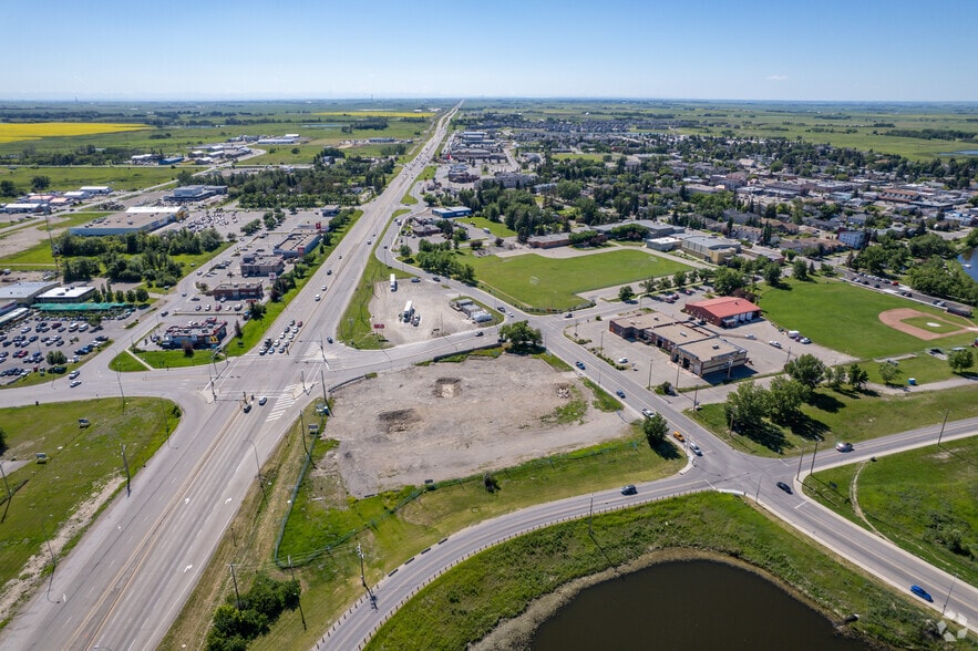 More Photos Of 80A Archie Klaiber Trl, Strathmore Storefront For Sale