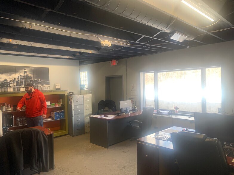 More Photos Of 1704 E Highland Rd, Highland Township Warehouse For Sale