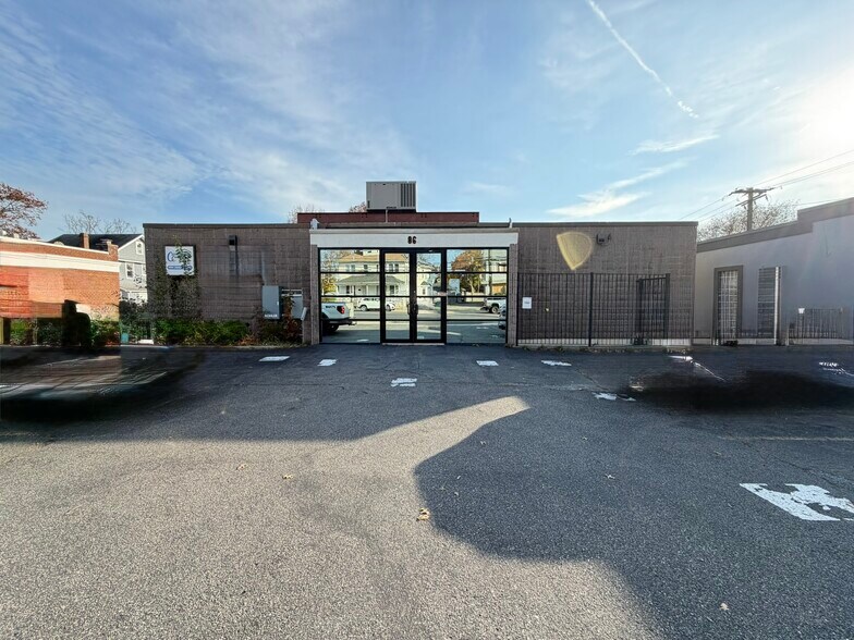 Primary Photo Of 86 Front St, Hempstead Storefront Retail Office For Sale