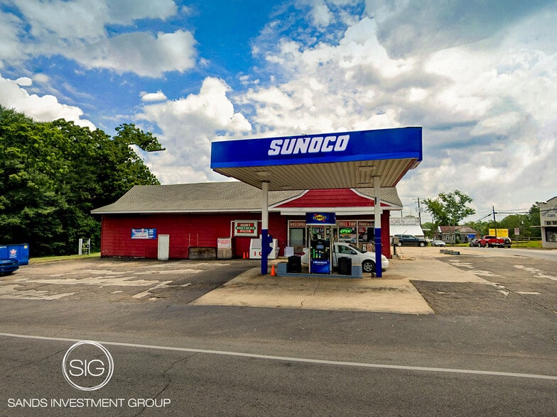 Primary Photo Of 100 N College St, Greenville Convenience Store For Sale