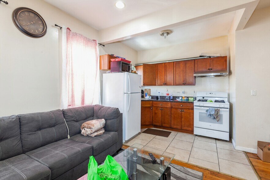 More Photos Of 100-10-100-12 103rd Ave, Ozone Park Multifamily For Sale