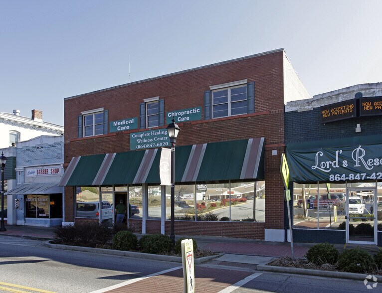 Primary Photo Of 26 E Main St, Williamston Storefront Retail Office For Sale