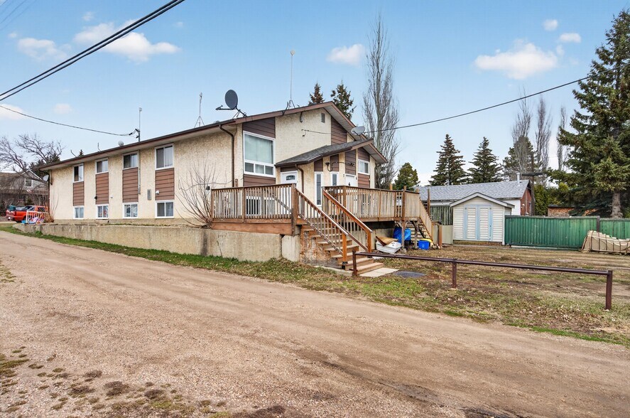 More Photos Of 5015 48 St, Legal Apartments For Sale