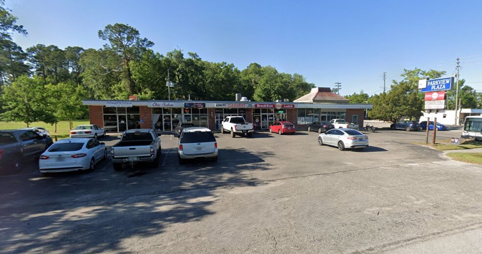 Primary Photo Of 215 NE 16th Ave, Gainesville General Retail For Sale