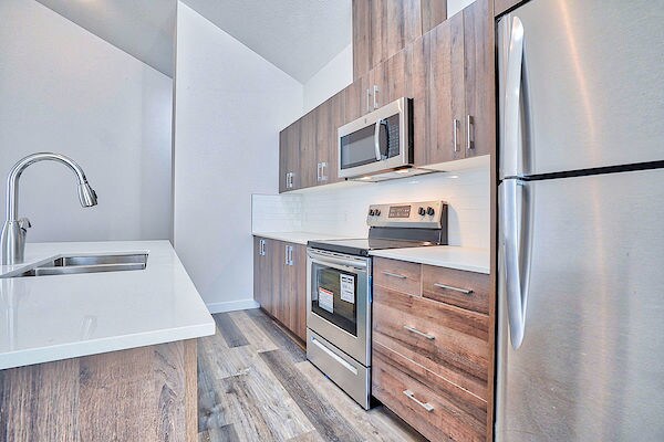 More Photos Of 303 Waddy Lane, Strathmore Multifamily For Sale