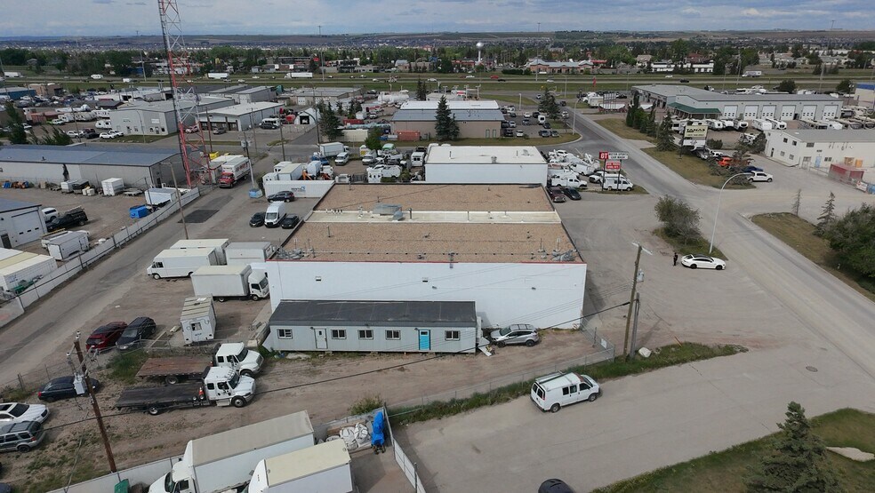 More Photos Of 59 East Lake Cres NE, Airdrie Service For Sale