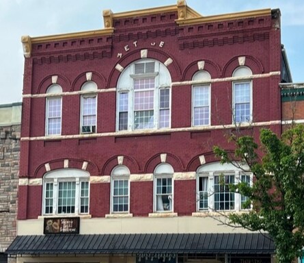 Primary Photo Of 12 E 4th St, Emporium Storefront Retail Residential For Sale