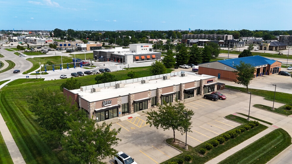 Primary Photo Of 55-95 Dartmoor Dr, Waukee General Retail For Lease