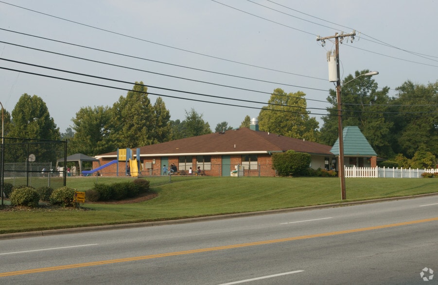 Primary Photo Of 337 W Vandalia Rd, Greensboro Storefront Retail Office For Sale