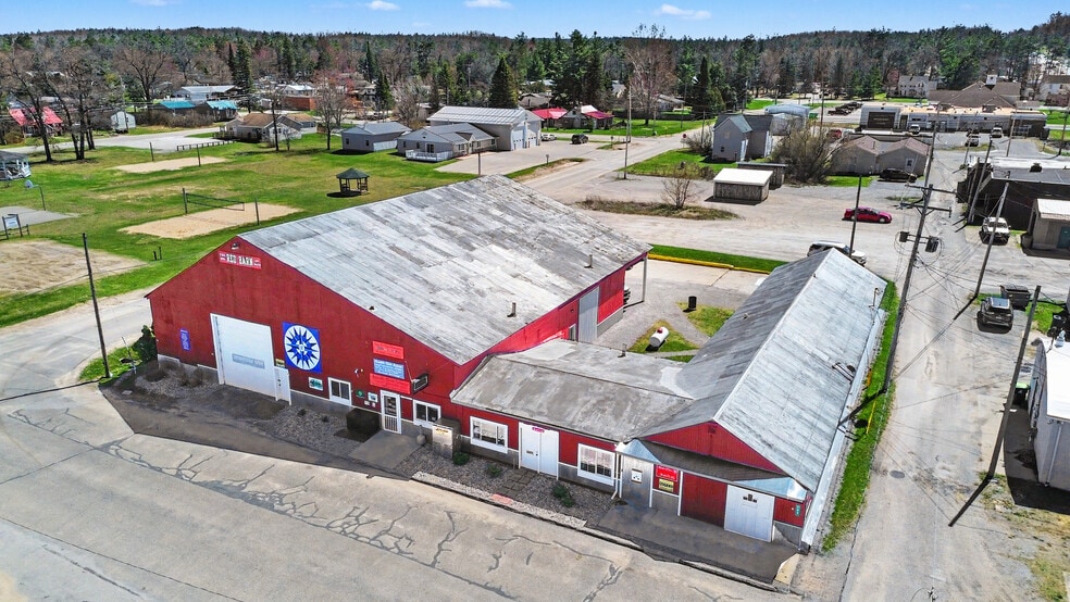Primary Photo Of 202 E 9th St, Mio Storefront Retail Office For Sale