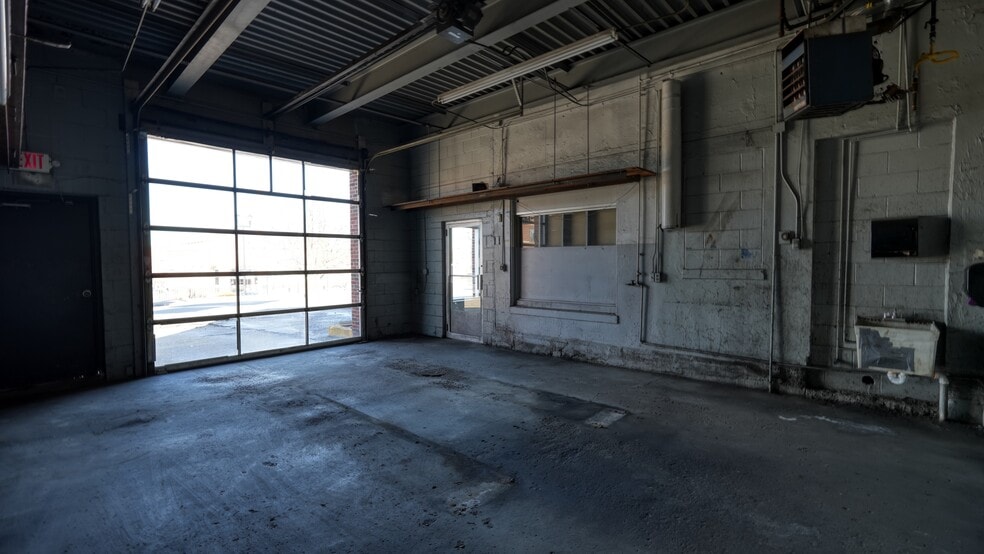 More Photos Of 1105 Wheeling Ave, Cambridge Auto Repair For Sale