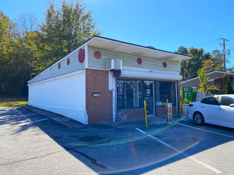 Primary Photo Of 5710 N Main St, Columbia Storefront Retail Office For Sale