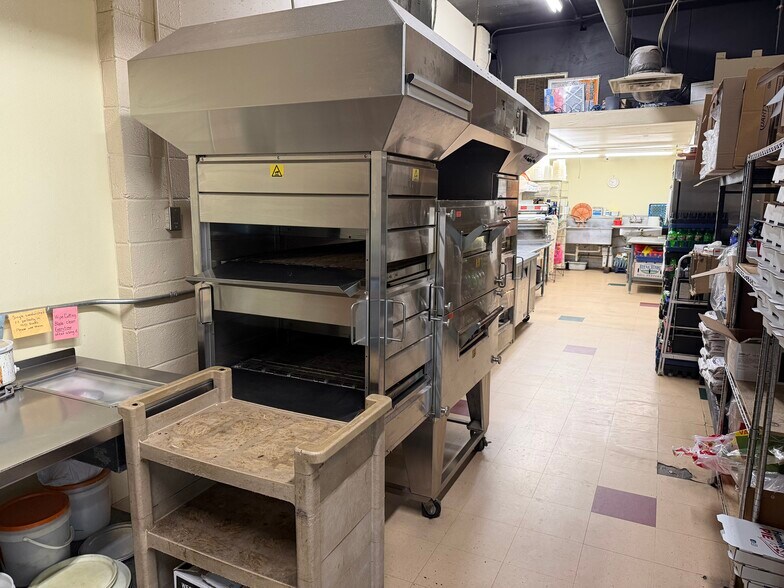 More Photos Of 730 E 1st St, Pratt Freestanding For Sale