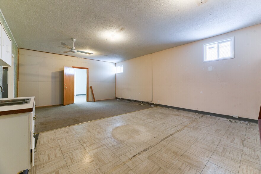 More Photos Of 228 Centre St NE, Langdon Flex For Sale