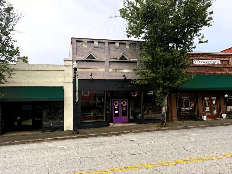 Primary Photo Of 108 N Main St, Greensboro General Retail For Sale