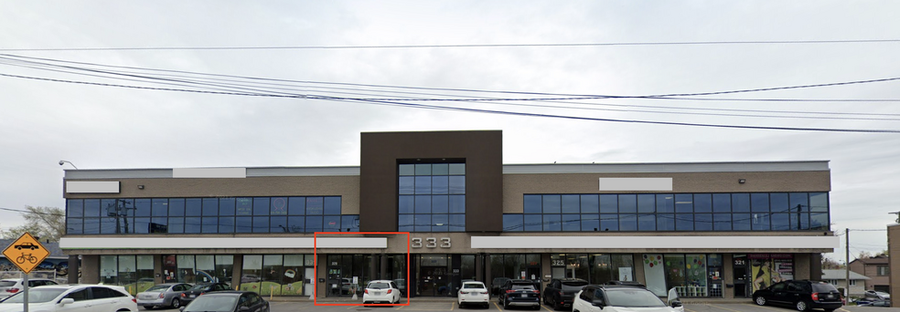 Primary Photo Of 321-335 Boul Saint-Martin O, Laval Storefront Retail Office For Lease