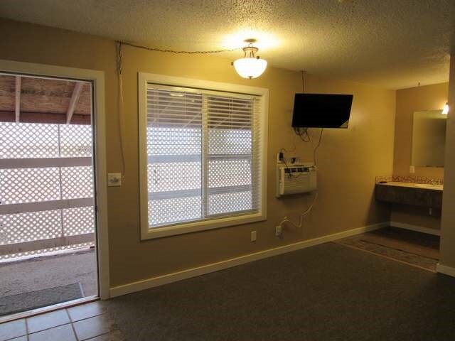 More Photos Of 681 7th St SW, Halliday Hotel For Sale