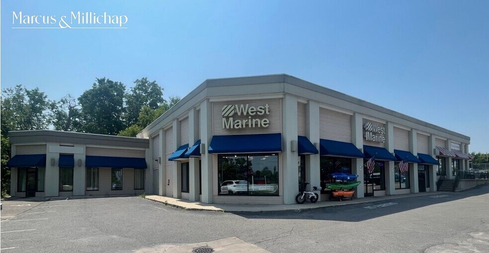 Primary Photo Of 105 W Mitchell St, Petoskey General Retail For Sale