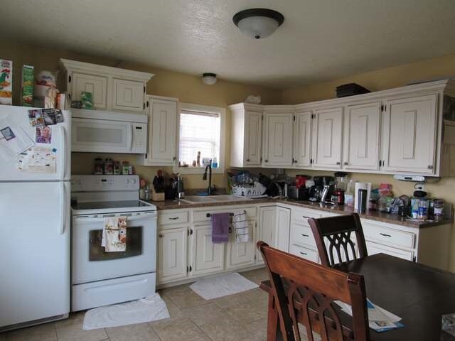 More Photos Of 681 7th St SW, Halliday Hotel For Sale