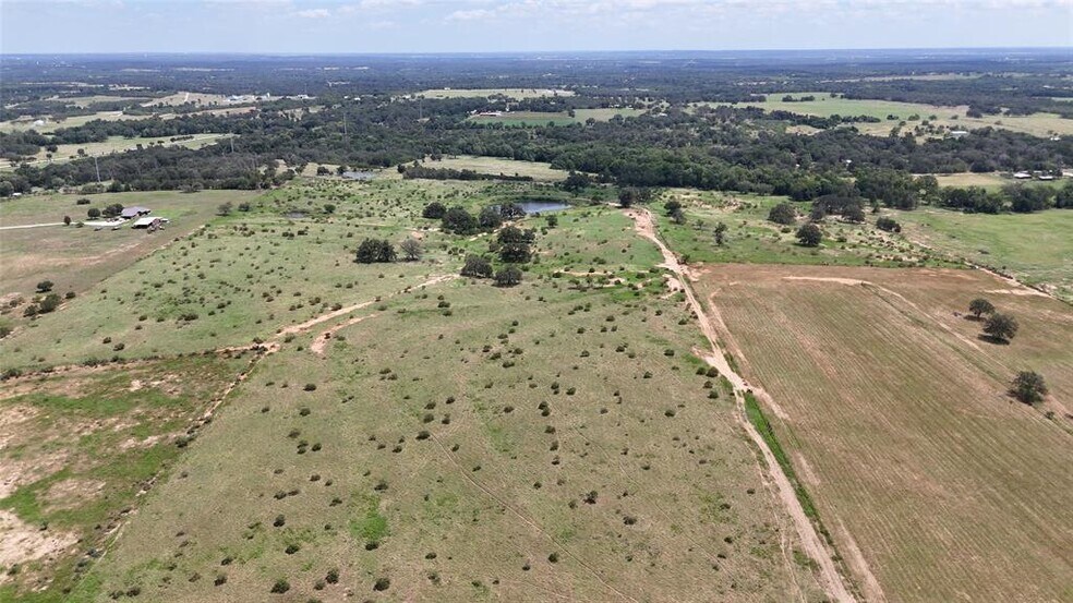 More Photos Of TBD Tucker ln, Red Rock Land For Sale