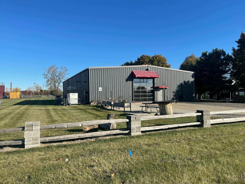 Primary Photo Of 105 E Russell Rd, Tecumseh General Retail For Lease