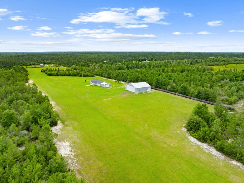 More Photos Of 22303 Longleaf Rd NW, Fountain Airport For Sale