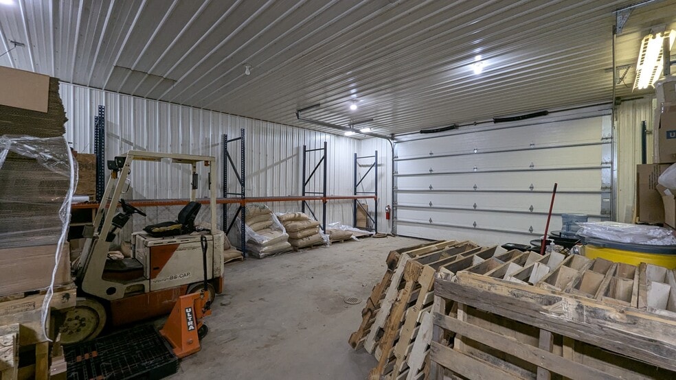 More Photos Of 173 E Kasson Rd, Maple City Industrial For Sale