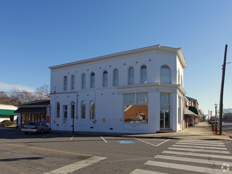 Primary Photo Of 146-148 W Trade St, Dallas Storefront Retail Office For Lease