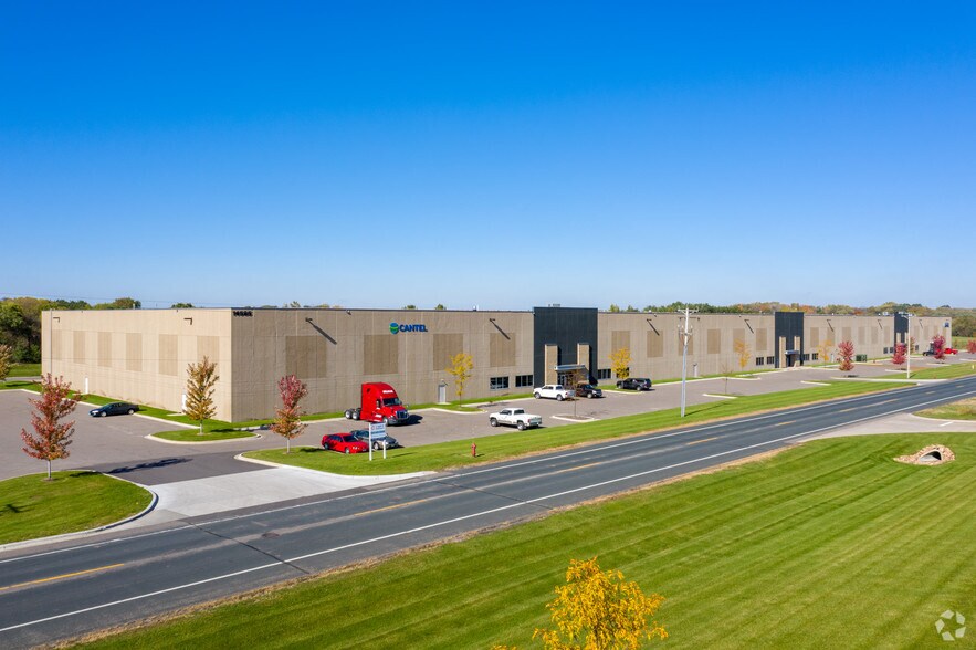 More Photos Of 14140-14198 Northdale Blvd, Rogers Showroom For Lease