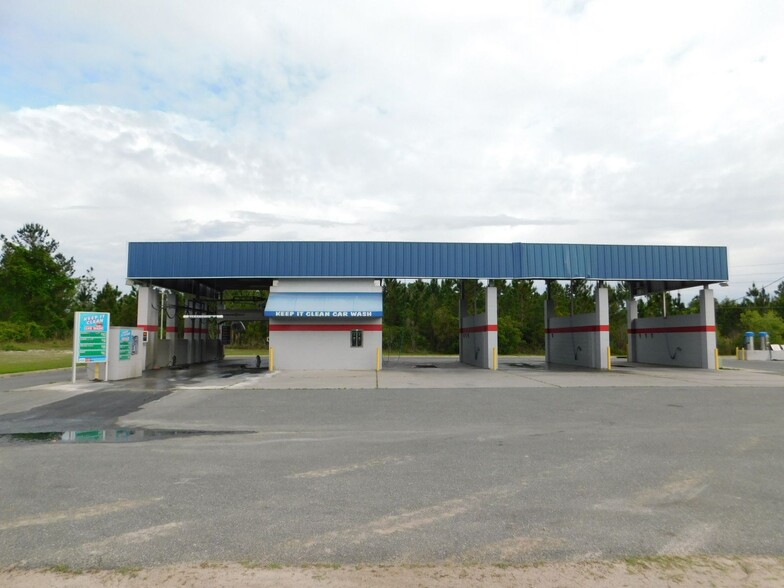 Primary Photo Of 1174 SW Real Ter, Lake City Carwash For Sale