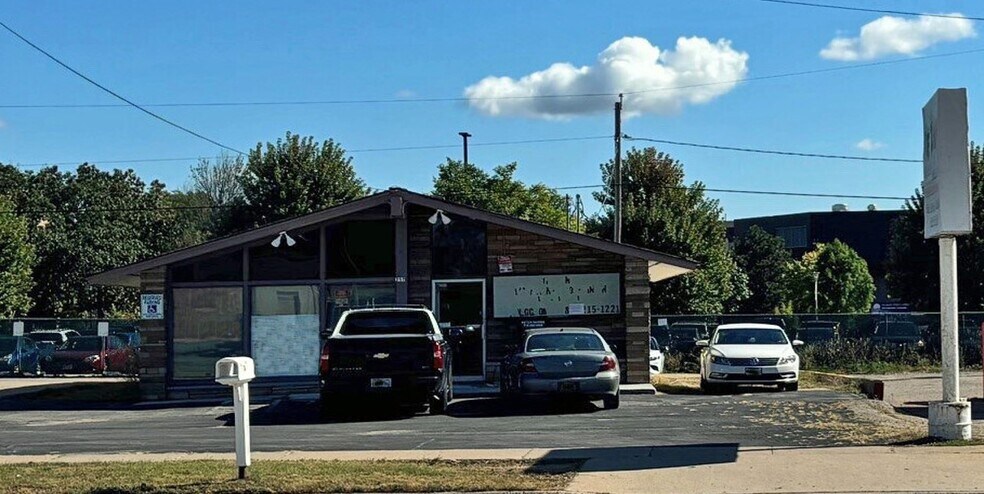 Primary Photo Of 257 Division St, Stevens Point General Retail For Sale