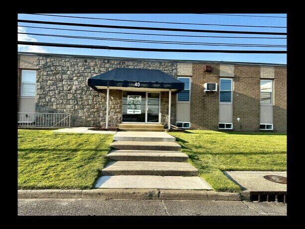 Primary Photo Of 40 Commerce Pl, Hicksville Office For Lease