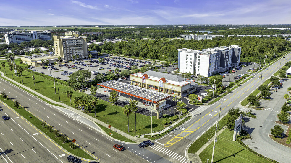 Primary Photo Of 5600 Butler National Dr, Orlando Service Station For Sale