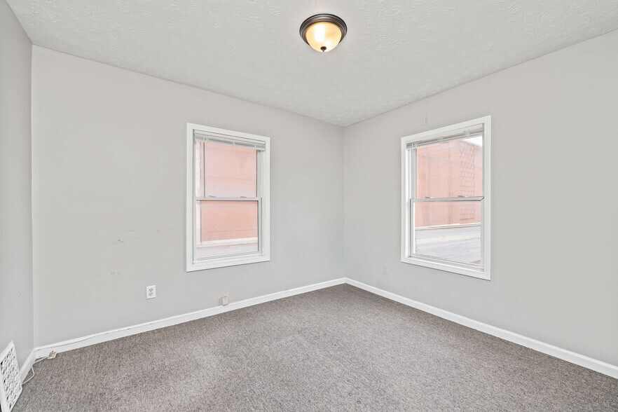 More Photos Of 135 W Ridge Rd, Rochester Storefront Retail Office For Sale