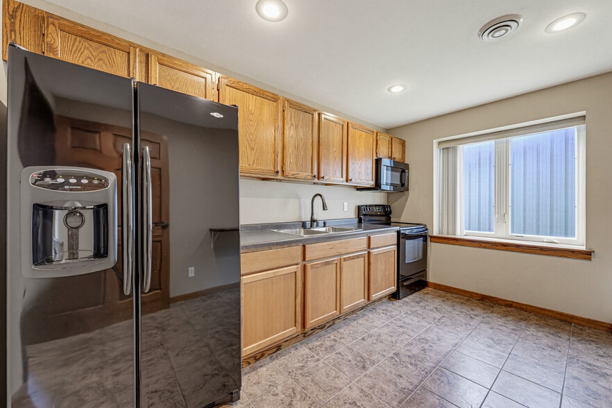 More Photos Of 104 Cedar Ave S, Watkins Warehouse For Sale