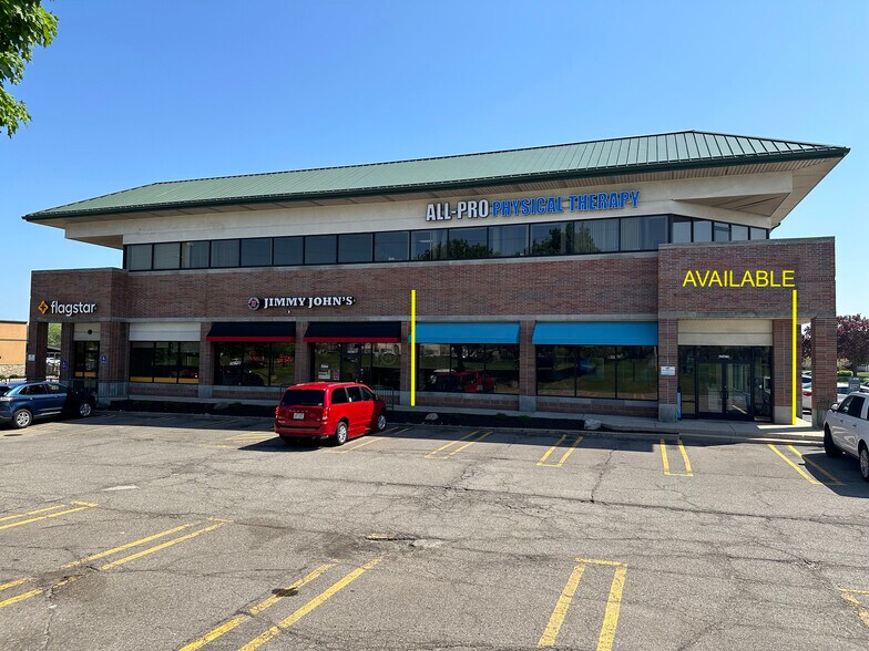 Primary Photo Of 37655-37699 Six Mile Rd, Livonia Office For Lease