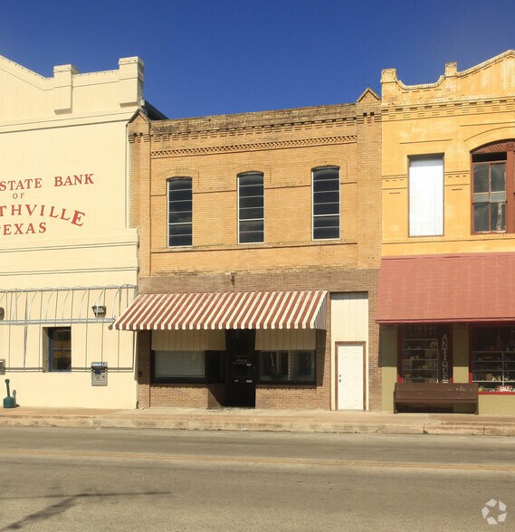 Primary Photo Of 203 Main St, Smithville Storefront Retail Residential For Sale