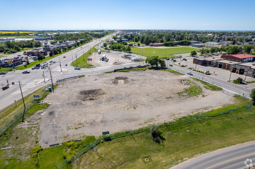 More Photos Of 80A Archie Klaiber Trl, Strathmore Storefront For Sale