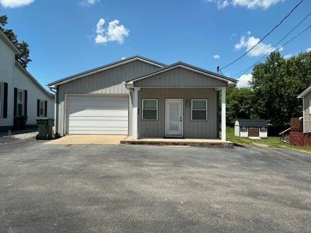 Primary Photo Of 47 N Seminary St, Madisonville Office For Sale