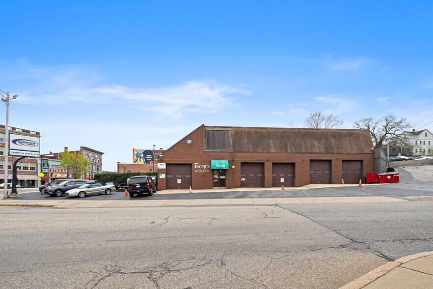 Primary Photo Of 18 Blackstone St, Woonsocket Auto Repair For Sale