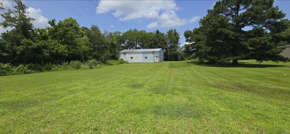 More Photos Of 2013 Falls Blvd N, Wynne Sports And Entertainment For Sale