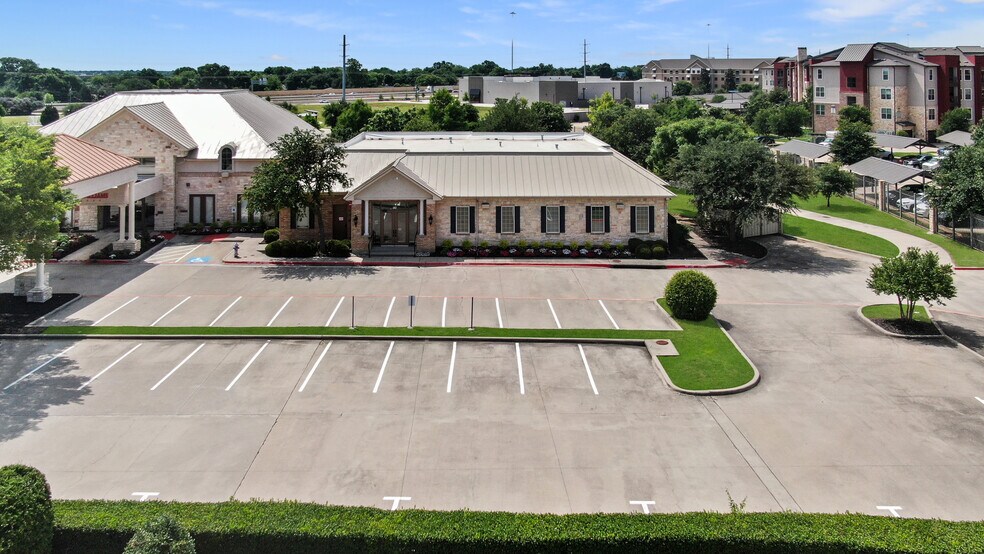 More Photos Of 1002 Raintree Circle, Allen Office For Lease