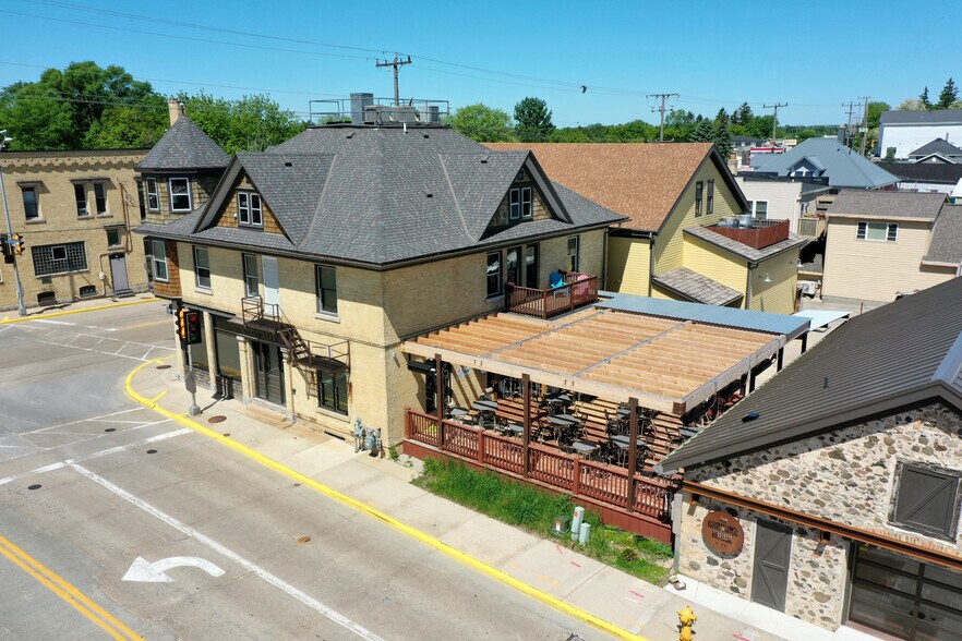Primary Photo Of 100-104 W Washington St, Slinger Bar For Sale