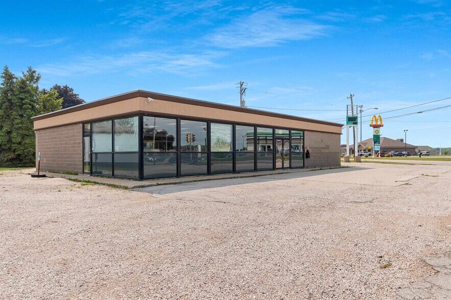 Primary Photo Of 107 Main St, Luxemburg Convenience Store For Sale